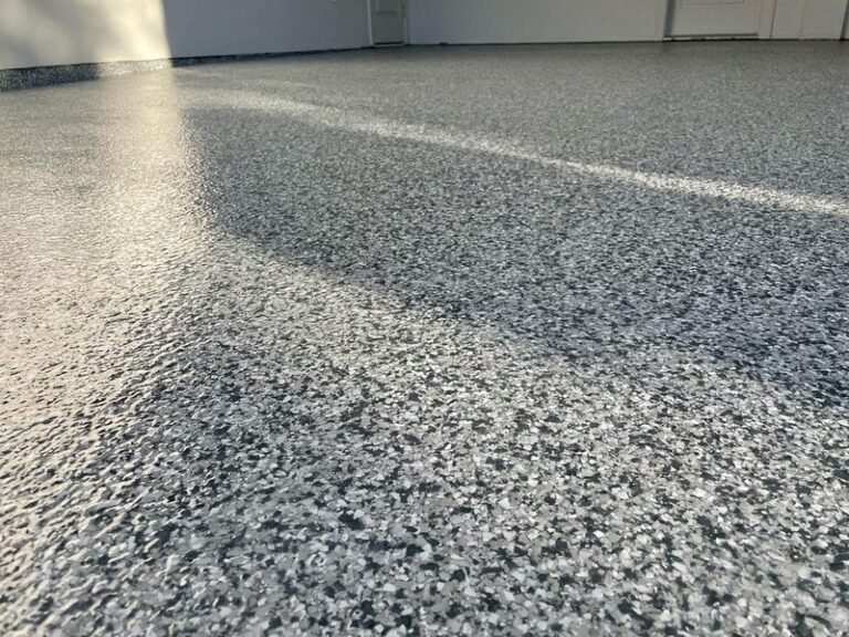 A marble design epoxy flooring in a garage.
