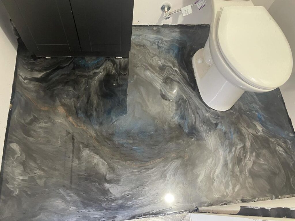 Metallic Epoxy Flooring in a residential toilet room
