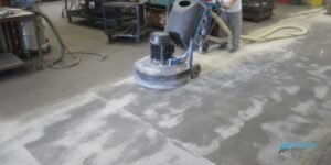 clean up dust concrete after griding with vancouver epoxy flooring contractor